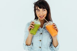 Woman drinking fruit juice