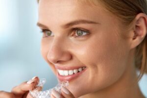 woman-with-invisalign-2-1024x672